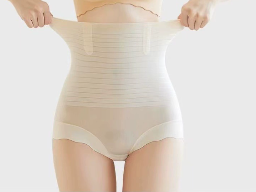display of nude high waist tummy control shapewear panties by model front view