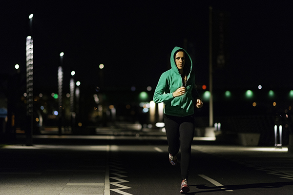 A girl runs at night!