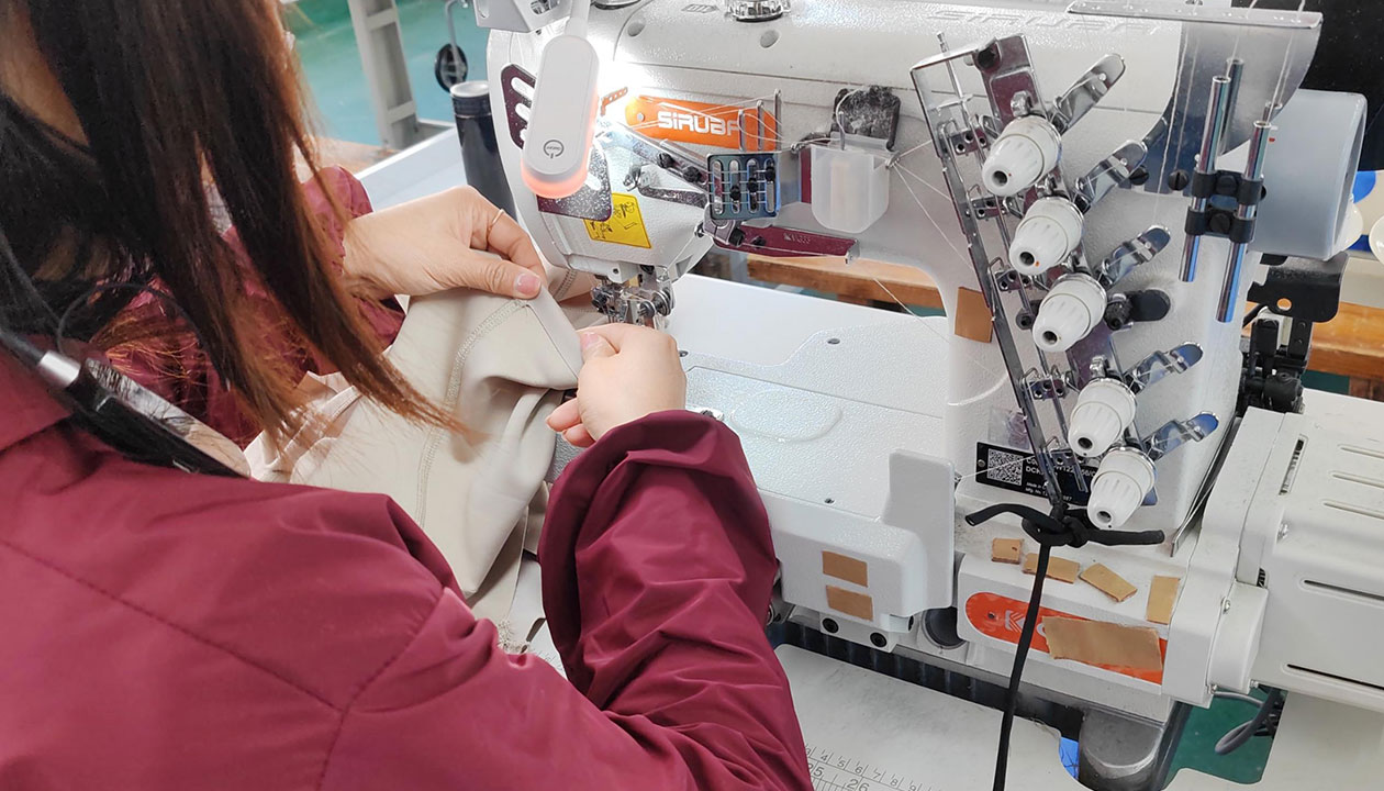 Fajas colombianas being sewn on our production line in Shenzhen